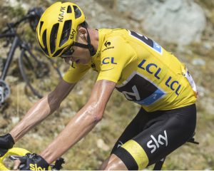 Col de la Croix de Fer, France - 25 July 2015: Profile of Christopher Froome of Team Sky in Yellow Jersey in full effort, climbing to the Col de la Croix de Fer in Alps during the stage 20 of Le Tour de France 2015.
